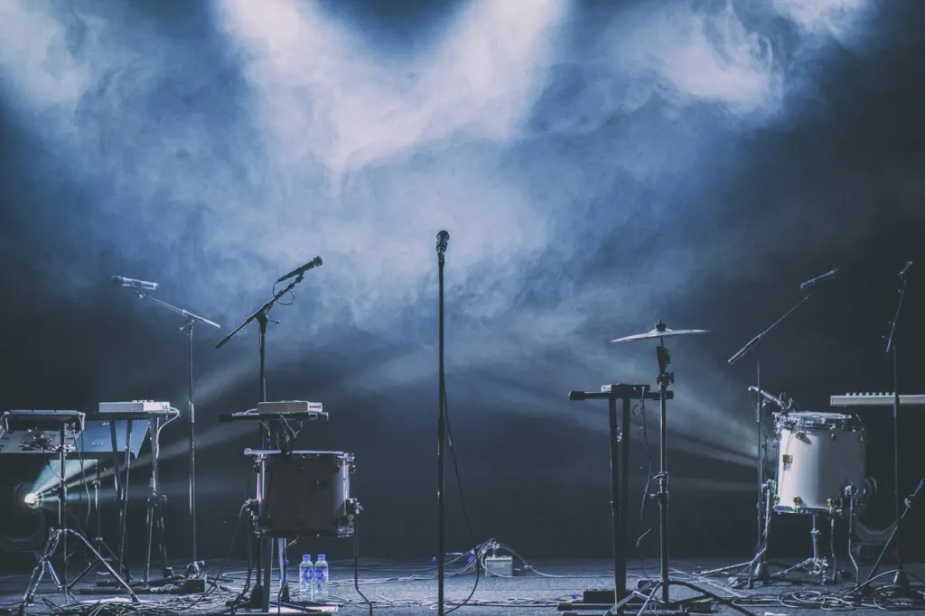 Stage with blue spotlights and haze